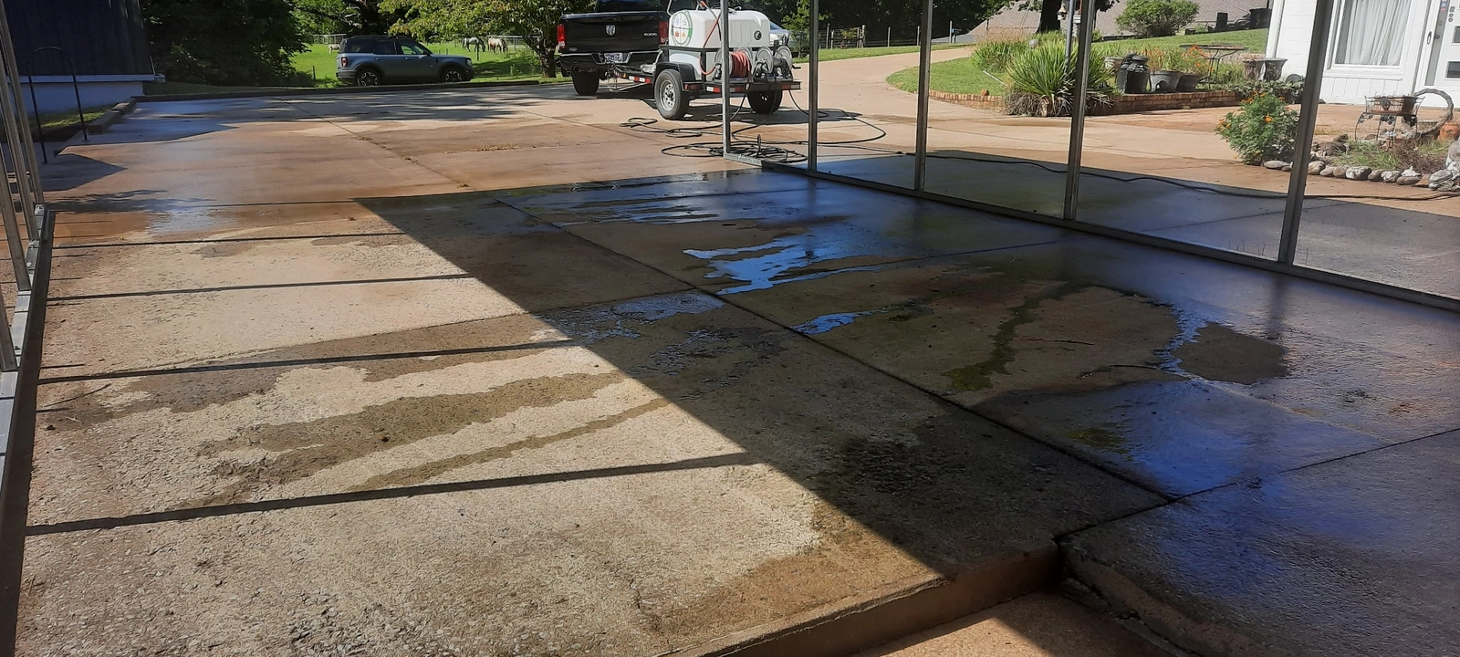 Before cleaning: Carport Slab Cleaning — Wilson County, TN